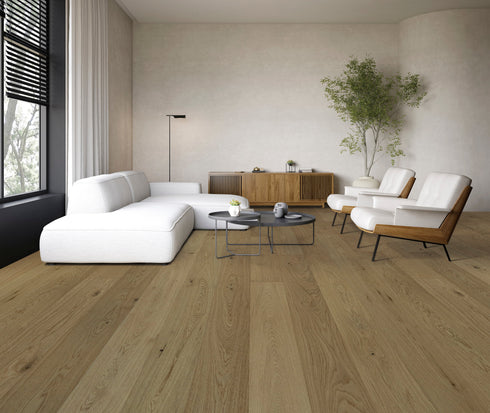 White sofa in a living room on a mid smoky brown oak floor with grain and knots